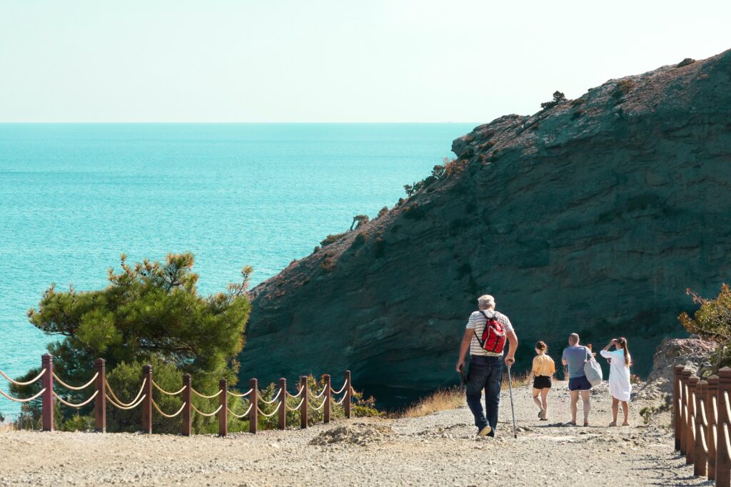 An elderly man hiking